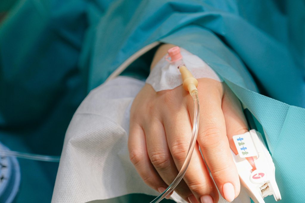 pexels photo 3845126 3845126 Close-up of a patient's hand with intravenous therapy and pulse oximeter, symbolizing healthcare and treatment.